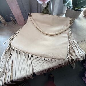 Altar'd State brand handbag leather with fringe.
